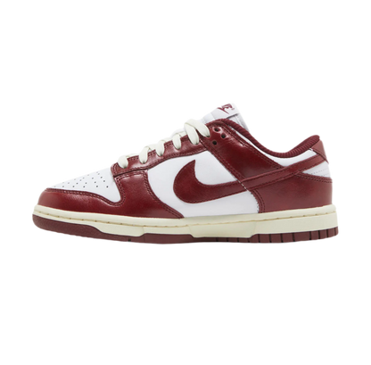 Women’s Nike Dunk Low Premium "Vintage Red" sneakers.