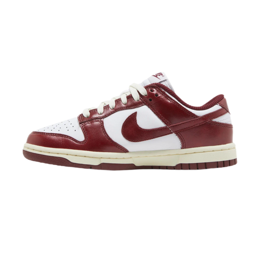 Women’s Nike Dunk Low Premium "Vintage Red" sneakers.