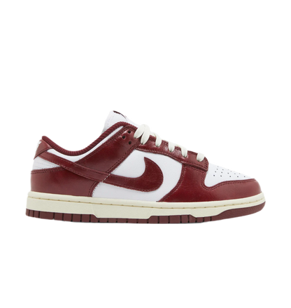 Women’s Nike Dunk Low Premium "Vintage Red" sneakers.